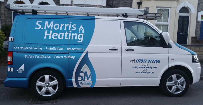 S.Morris Heating Van parked outside of houses - boiler servicing & installation, gas inspections, Norwich, Norfolk